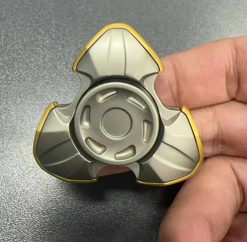 Metal mecha-style finger spinner