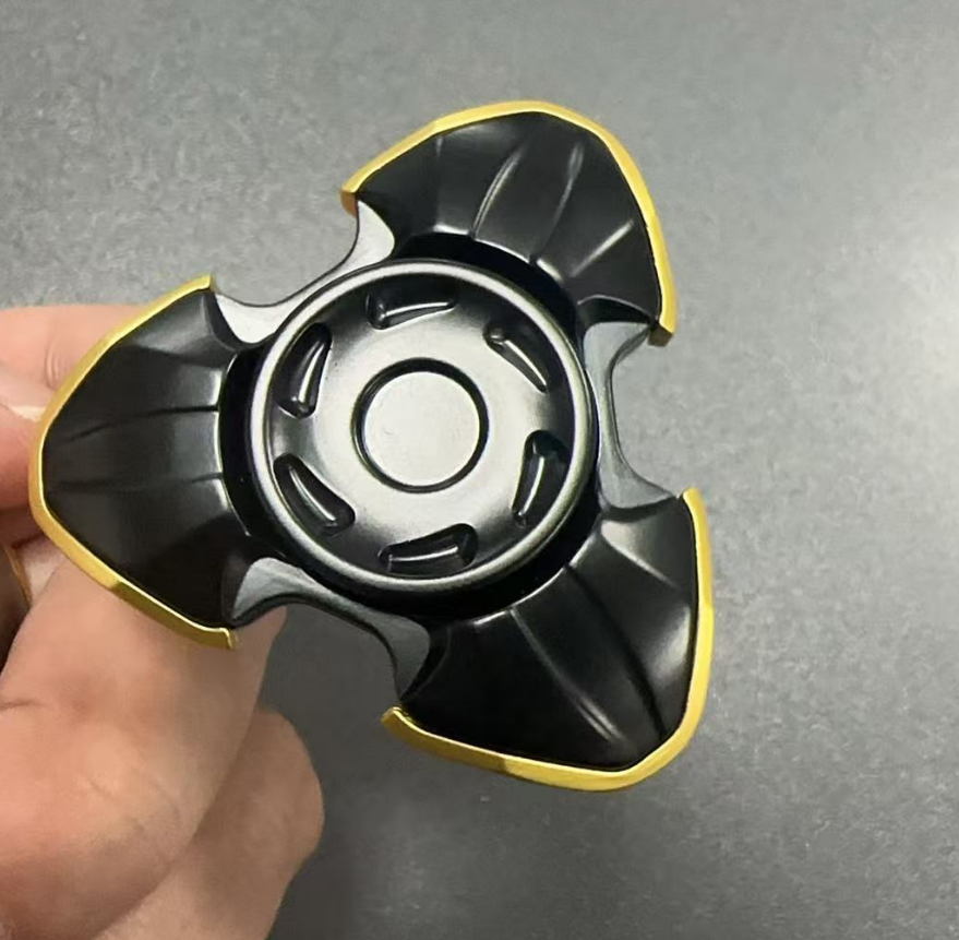 Metal mecha-style finger spinner