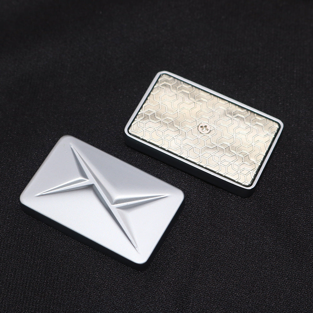 Metal-style poker card finger toy