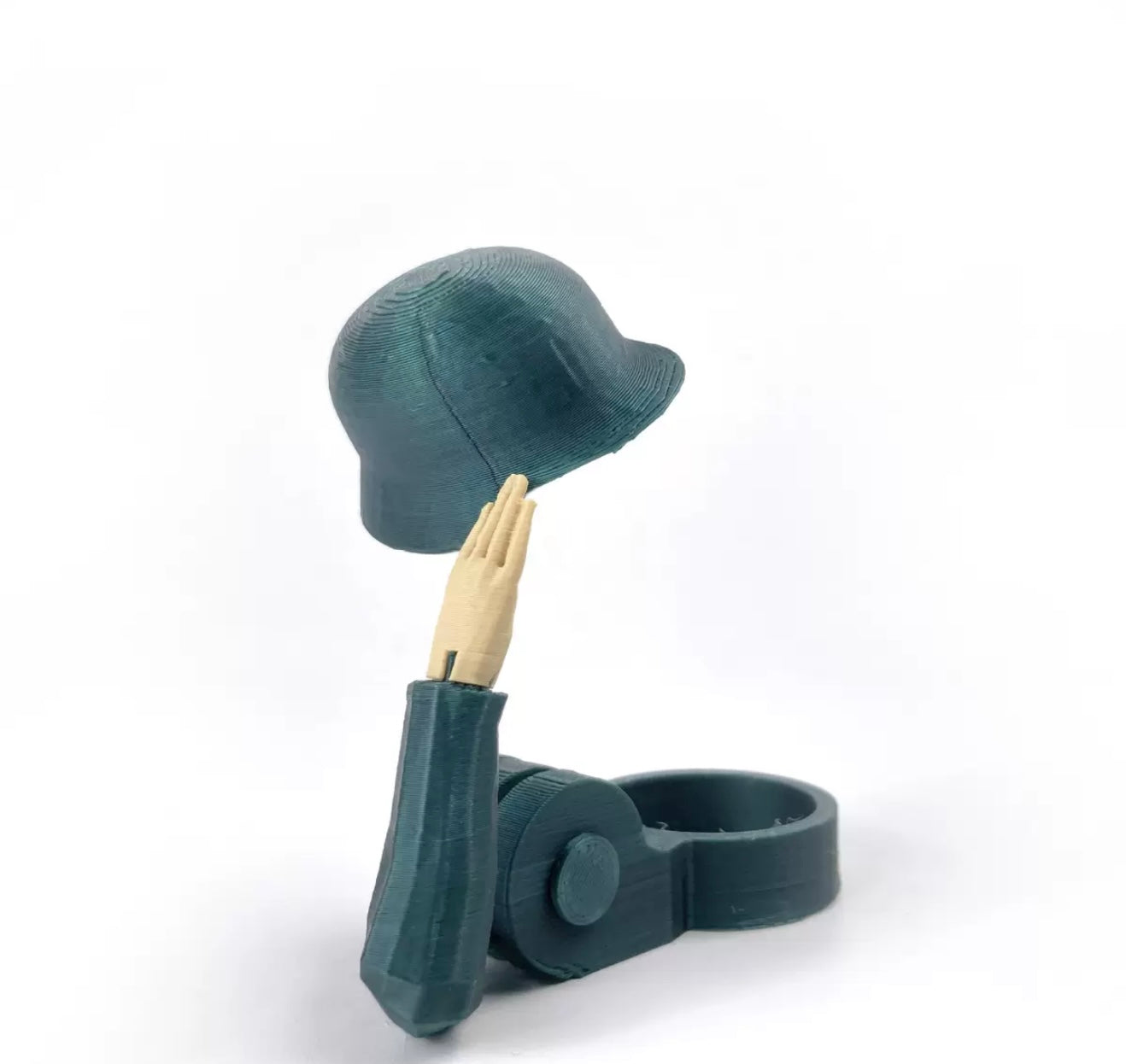 Soldier salutes the beer bottle cap