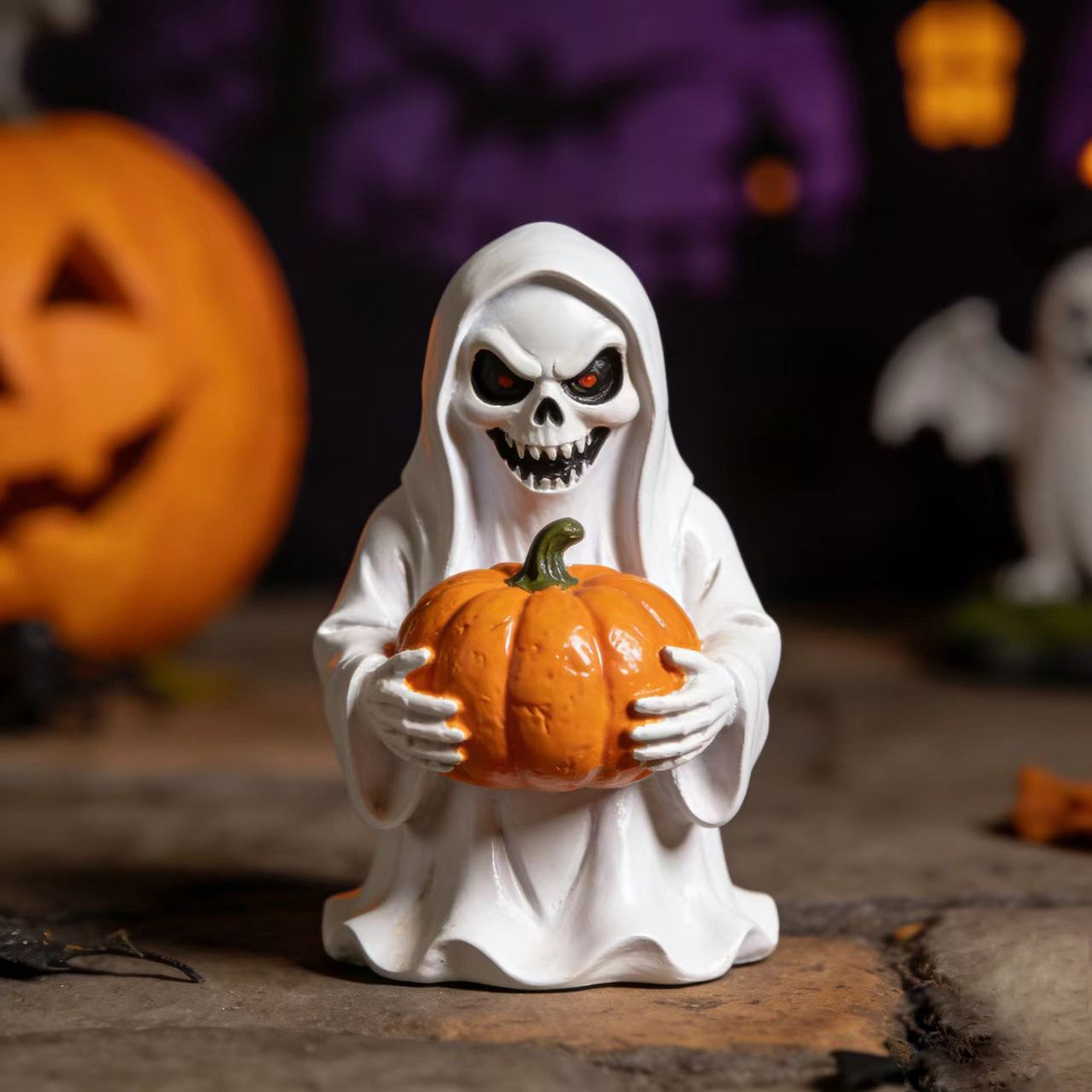 Halloween-style pumpkin skull figurine
